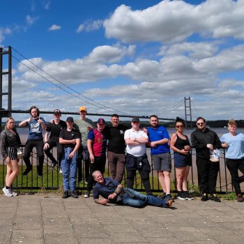 An image showing one of CatZero's Employability groups in front of the Humber Bridge on a sunny day